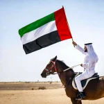 ⁦أعلام دولة الإمارات العربية المتحدة - قماش ساتان - مقاس 150 × 90 سم⁩ - الصورة ⁦2⁩