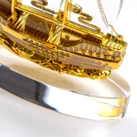 Golden Boat-Shaped Memento in Metal with Glass Base - Image 5